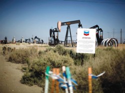 Chevron a impartit rucsacuri cu rechizite, dulciuri si scrisori "de curtoazie" catre 600 de elevi din Bacesti